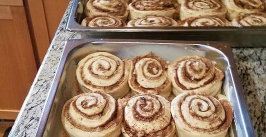 Tray full of cinnamon rolls